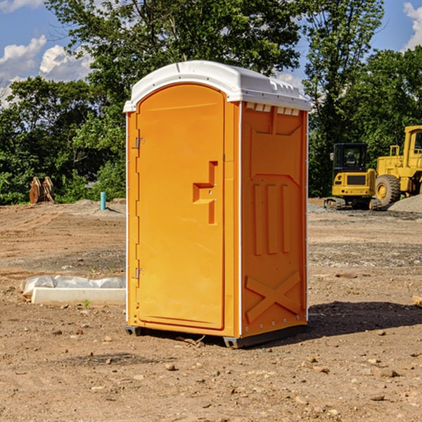 how often are the portable restrooms cleaned and serviced during a rental period in Harmony